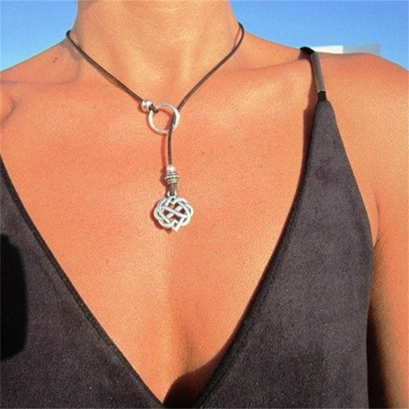 Blossom And Radiate Cross Woven Cowhide Rope Necklace